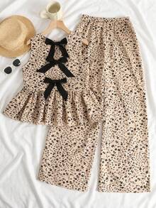 SHEIN Kids Summer Squishy 2pcs/Set Teen Girls Chiffon Ditsy Floral Sleeveless Top And Loose Casual Pants Set, Suitable For Casual, Resort, French Style, Lunch, Party, Countryside Girls Floral Two Piece Set Girls Floral Pants Set Girls Pajamas Floral Spring Clothes For Girls Wide Leg Pants Bowknot Peplum Top Floral Print Set - Apricot - View 3