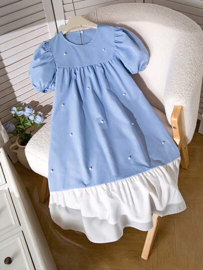SHEIN Chiếc đầm phối màu xanh dương và trắng thanh lịch này dành cho các bé gái tuổi teen có tay phồng và được đính cườm tinh tế ở phía trước, hoàn hảo cho các bữa tiệc sinh nhật mùa xuân/hè, những buổi hẹn hò và các dịp đặc biệt khác.