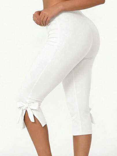 SHEIN SXY Solid Color Bow Tie Cropped Leggings