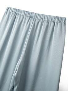 GlowEve CURVE Pantalones casuales de satén texturizado azul para mujer talla grande, pantalones de seda para mujer, pantalones de yoga, pantalones de seda de hielo, pantalones de pierna ancha, pantalones de satén, estilo de mujer, adecuados para salidas diarias y fáciles de combinar con atuendos. Pantalones de pierna ancha, pantalones de moda para mujer, pantalones de satén para mujer, pantalones con cordón en la cintura - Azul - Ver 7