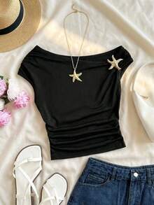 Top asimétrico de hombro negro y silueta corta de un hombro para niñas preadolescentes, con decoración de estrella de mar dorada, de tela suave y amigable con la piel, hombro oblicuo único y decoración exquisita, adecuado para ocasiones diarias/de moda ligera, sin restricciones y fácil de combinar, para crear un look fresco y elegante de niña - Negro - Ver 7