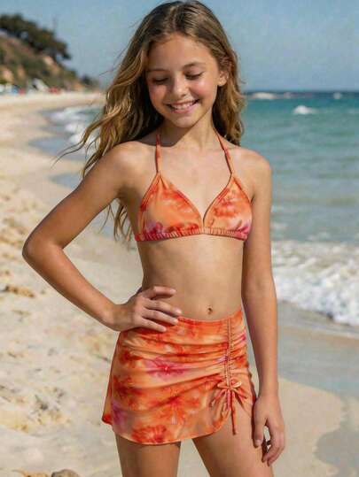 SHEIN Bộ bikini 3 mảnh họa tiết hoa nhiệt đới dành cho bé gái tuổi teen, thích hợp cho kỳ nghỉ biển, màu cam ngọt ngào và rực rỡ.