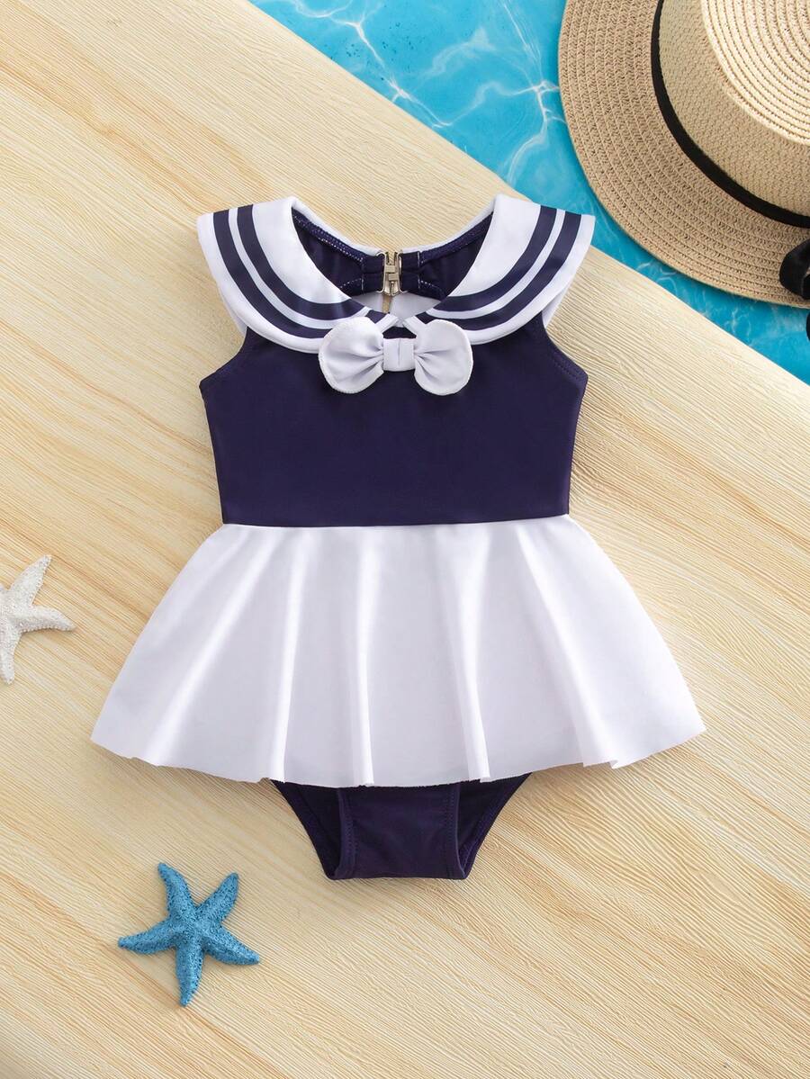SHEIN Bộ đồ bơi liền thân phối màu cho bé gái với họa tiết nơ - Màu xanh hải quân - Xem 1