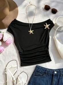 Top asimétrico de hombro negro y silueta corta de un hombro para niñas preadolescentes, con decoración de estrella de mar dorada, de tela suave y amigable con la piel, hombro oblicuo único y decoración exquisita, adecuado para ocasiones diarias/de moda ligera, sin restricciones y fácil de combinar, para crear un look fresco y elegante de niña - Negro - Ver 6
