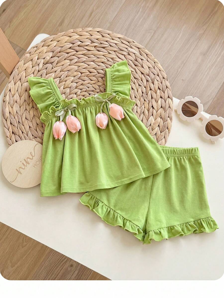 SHEIN LMoss Kids 两件套女婴夏季可爱休闲绿色荷叶边碎花吊带背心和松紧腰短裤套装 绿色女婴服装 绿色荷叶边套装 婴儿绿色泡泡套装 橄榄绿女婴连衣裙 两件套夏季服装 深绿色女婴套装 夏季绿色连衣裙套装 女婴服装 绿色女婴短款绿色套装 亚麻套装 上衣和裙子 - 綠色 - 查看 1