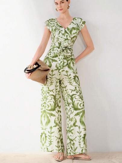 Aveloria Modichic Bộ jumpsuit cổ chữ V bèo nhún màu trắng và xanh lá cây, chất liệu vải sợi tre, ống quần rộng thẳng, nhẹ, thích hợp cho dã ngoại, đi biển, tụ họp thường ngày, tiệc trà chiều, hoạt động ngoài trời mùa hè, mang đến vẻ thanh lịch tự nhiên, thoải mái. Bộ jumpsuit không tay bèo nhún màu xanh lá cây và trắng, thắt eo, sang trọng và tinh tế cho công sở và các dịp thường ngày.