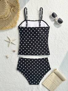 SHEIN Bộ bikini chấm bi cho bé gái tuổi teen, kiểu dáng retro dễ thương, ôm sát, đồ bơi mùa hè cần thiết cho việc đi bơi và nghỉ mát, đồ bơi trẻ em chấm bi đen trắng cổ điển, thiết kế dây mảnh + eo nhún, ngọt ngào và nữ tính, hoàn hảo cho ảnh chụp ở hồ bơi, phù hợp cho kỳ nghỉ, tiệc bể bơi, bơi biển. Đồ bơi chấm bi, đồ bơi chấm bi cho thiếu nữ, đồ bơi chấm bi cho thanh thiếu niên, đồ bơi chấm bi che phủ toàn thân. - Đen và trắng - Xem 2