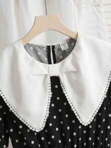 SHEIN 少女优雅返校季蝴蝶印花黑白撞色A字公主裙，适合春季假期、度假、派对、返校、假日家庭户外春季野餐、日常穿着。 - 彩色 - 查看 8