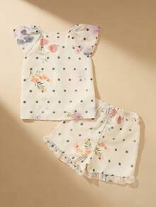 SHEIN Bộ đồ 2 mảnh cho bé gái, cổ tròn, không tay, gồm áo và quần short, họa tiết chấm bi màu nước nhạt, áo tay bồng kết hợp quần short viền bèo nhún, chi tiết cúc cài tinh tế, phù hợp cho mùa hè dạo phố, dã ngoại, phong cách Mori Girl Nhật Bản. - Màu be - Xem 2