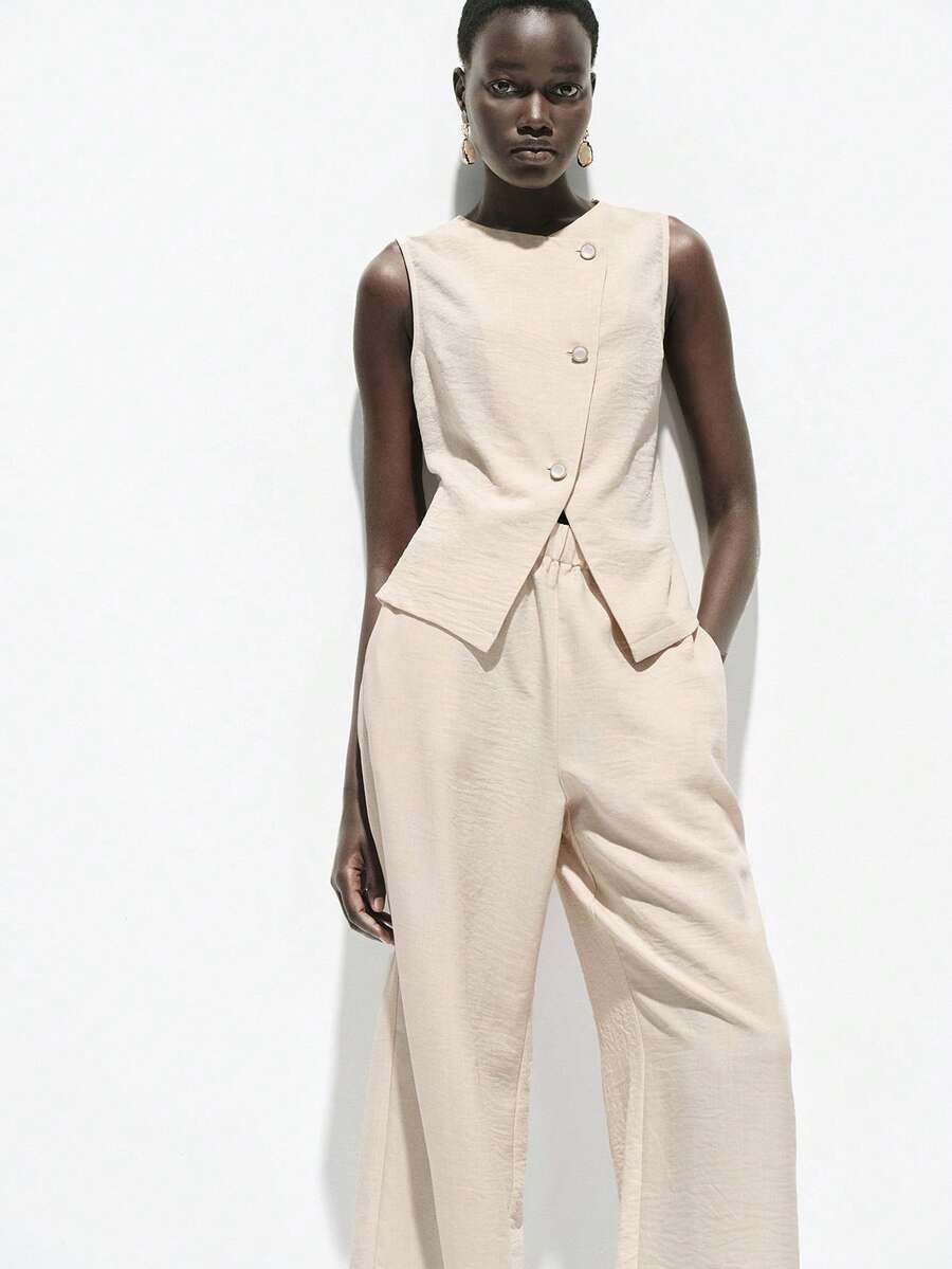 Lumivelle Bộ đồ nữ gồm áo không tay pha vải lanh và quần ống rộng thoải mái, thích hợp cho mùa xuân/hè. - Màu be - Xem 1