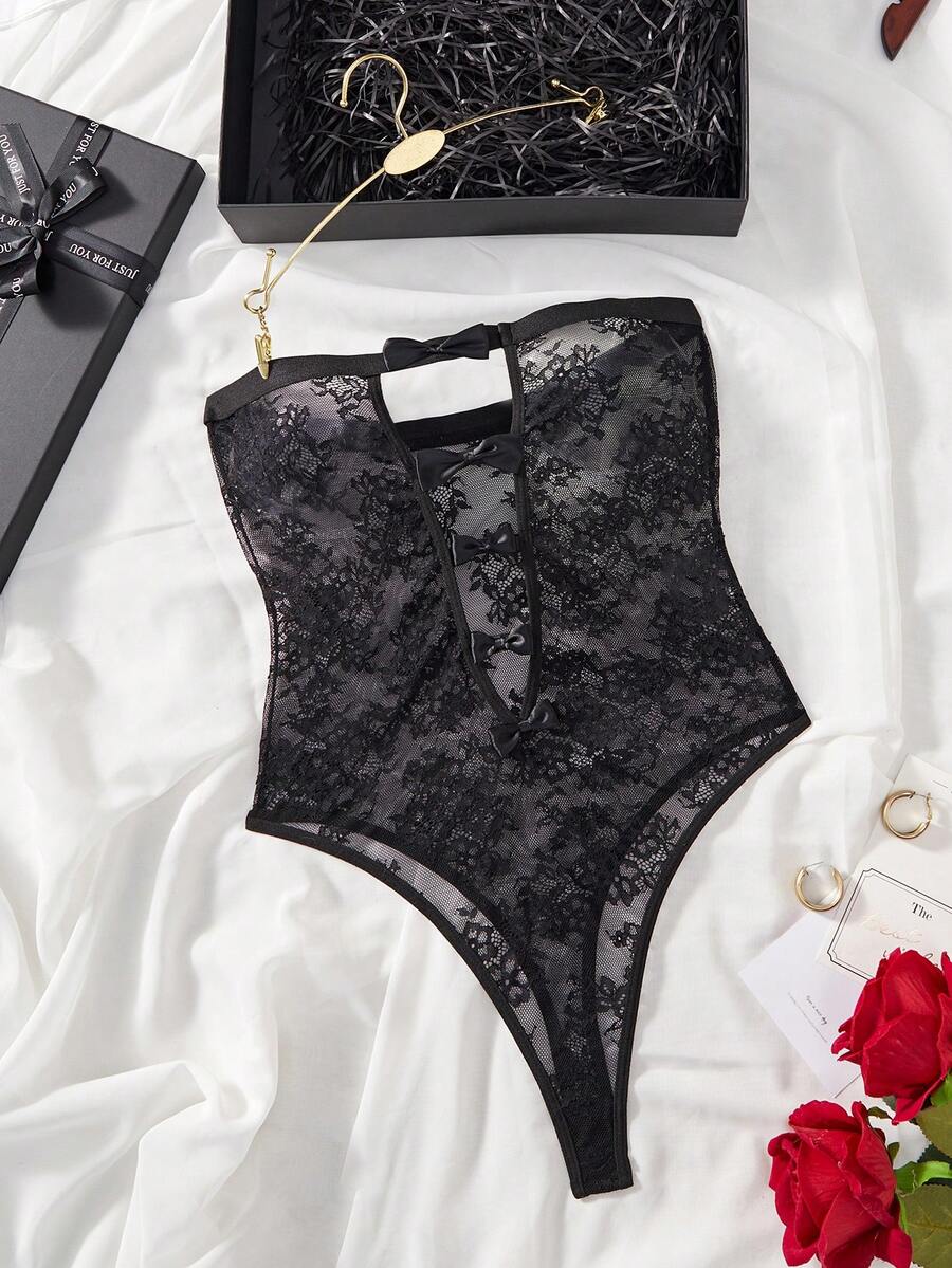SHEIN Bộ đồ liền thân ren trang trí nơ khoét rỗng, gợi cảm khi đi chơi, phong cách Baddie - màu đen - Xem 1