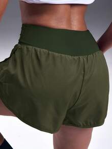 Powerista Solid Color Slant Pocket Summer Elastic Waist Sports Shorts - Green - View 3