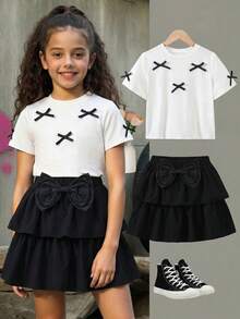 Elladie kids 女童可爱优雅校服连衣裙；黑白舒适短袖蛋糕裙，饰有3D蝴蝶结。白色蝴蝶结上衣搭配双层裙摆，适合日常或度假穿着。 - 黑色 - 查看 3