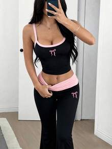 Bộ đồ nữ gồm áo hai dây in nơ và quần ống loe, thích hợp mặc hàng ngày vào mùa xuân/hè. - màu đen - Xem 5