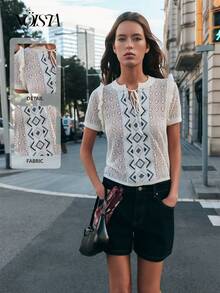 Nöista Áo dệt kim có họa tiết hình học ở trung tâm, tay ngắn bồng bềnh và cổ buộc dây. Thích hợp cho trang phục thường ngày, mùa xuân, mùa hè, đi biển. - Màu be - Xem 4