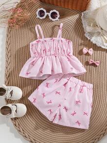 SHEIN Vintaside Kids 女嬰粉色夏季柔軟可愛度假休閒套裝 白色條紋露背掛脖上衣與裙子套裝 編織蝴蝶結荷葉邊裙襬俏皮套裝 - 淺粉色 - 查看 2