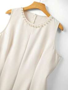 GlowEve CURVE 大码女装两件套：优雅黑色撞色珍珠串珠饰边V领长袖开衫外套和圆领珍珠装饰长裙，适合秋冬季休闲、工作、派对等场合。 - 杏色 - 查看 5