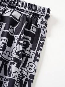 Tetris™ X SHEIN Bộ đồ ngủ nam in họa tiết hình học gồm áo và quần short - màu đen - Xem 7