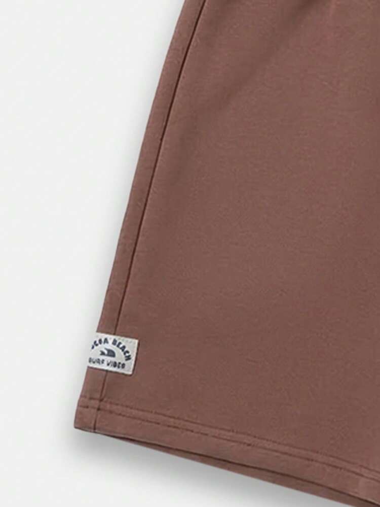 Conjunto coordinado de camiseta y pantalones cortos de dos piezas con estampado de puesta de sol y ajuste relajado de manga corta para uso casual de verano para niños