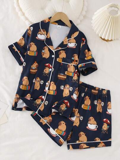 女童优雅休闲舒适可爱时尚经典藏蓝色卡通水豚印花柔软透气阻燃针织开衫短袖上衣和短裤睡衣套装，2件套