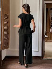 Serisse Bộ đồ nữ mùa xuân/hè, thích hợp mặc đi làm, đi chơi, đi nghỉ mát, gồm áo cổ chữ V cài kim loại và quần ống rộng, chất liệu vải có họa tiết. - màu đen - Xem 2