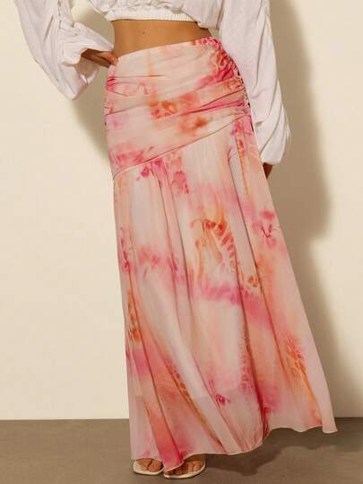 COSMINA Stylish Printed Maxi Skirt, Perfect For Summer. Features A Colorful, Blurred Print, Ideal For Summer Vacations. The Pleated Design And Flowing Chiffon Fabric Make It Suitable For Everyday Wear, Beach Vacations, And Romantic Getaways. A Must-Have Summer Skirt For Women.