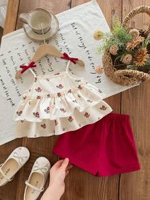 SHEIN Bộ đồ 2 mảnh dễ thương cho bé gái, gồm áo ba lỗ đen và quần short trắng đơn giản, được trang trí hoa 3D, rất phù hợp cho các bữa tiệc sinh nhật, tiệc tùng, biểu diễn, đám cưới, lễ rửa tội, lễ khai trương, mặc hàng ngày, đi học, dã ngoại và mùa xuân/hè. - màu đen - Xem 1