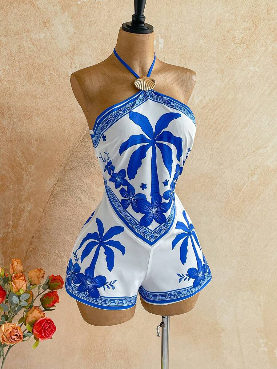Soleia Bộ jumpsuit ngắn hở lưng in họa tiết hoa nhiệt đới kiểu dáng mùa hè mới này, với điểm nhấn kim loại lấp lánh, hoàn hảo cho các bữa tiệc, hẹn hò, ngày Valentine, lễ Phục sinh, lễ hội, tiệc trà chiều, bãi biển, du thuyền, kỳ nghỉ thành phố, phong cách bohemian, họa tiết hoa lãng mạn và các dịp khác. - Nhiều màu - Xem 1