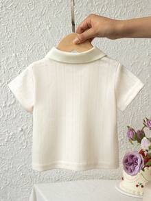 SHEIN Áo Polo mùa hè cho bé gái, chất liệu vải dệt kim jacquard mềm mại, khoét lỗ, cổ Peter Pan dễ thương, thêu hoa anh đào tinh tế, cổ áo mở nửa kín, kiểu Pháp ngọt ngào, thời trang, dễ thương, tươi mới. - Màu be - Xem 3