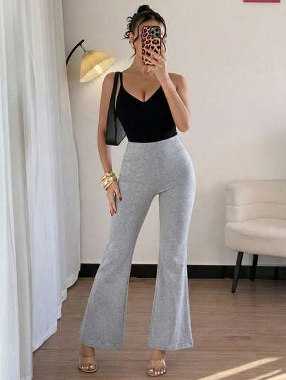 OYGA Pantalones casuales de punto de buena calidad, de talle medio, con pierna acampanada y ajuste ceñido para mujer