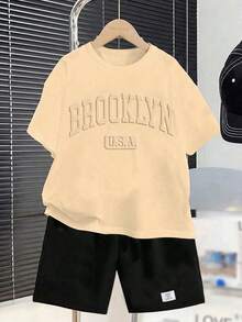 SHEIN 2pcs Tween Boy Casual Sports Loose Fit Embossed Letter Graphic Round Neck Short Sleeve T-Shirt And Elastic Waist Shorts Set, Suitable For Commuting, School, Daily Casual, Sports, Spring/Summer - Khaki - View 3