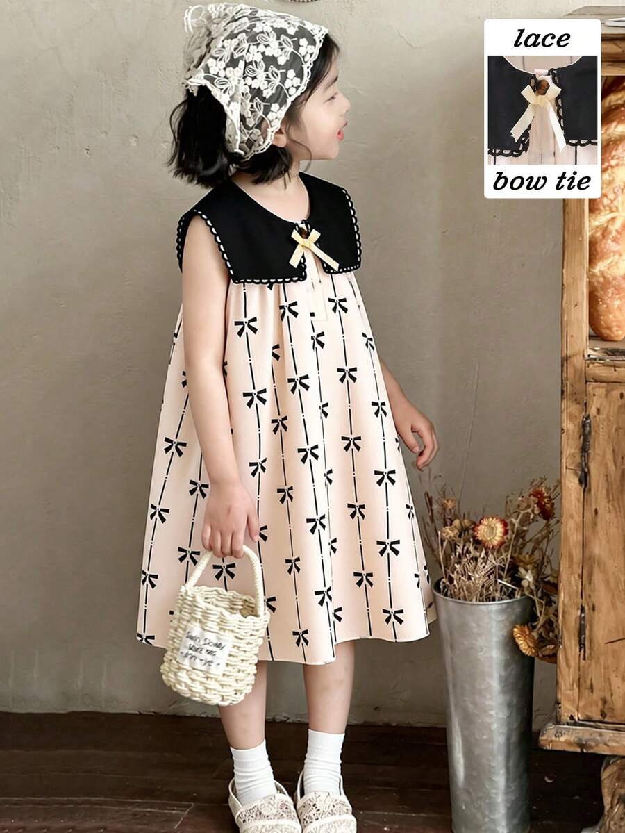 SHEIN Elladie kids 女童春夏简约时尚新款连衣裙，杏色丝带3D蝴蝶结装饰，杏色底黑色蝴蝶印花提花面料，黑色简约花领，咖啡琥珀色纽扣半开襟无袖连衣裙，适合年轻女孩，韩式简约优雅风格，休闲时尚，适合上学、外出、度假、春夏穿着。夏季服装。柔软舒适。 - 杏色 - 查看 1