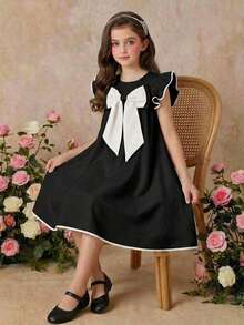 SHEIN Đầm bé gái kiểu dáng thanh lịch thành thị, cổ tròn, viền tương phản, tay loe, đính nơ lớn, dáng chữ A, màu trắng, chất liệu vải dệt, cổ búp bê. - Đen và trắng - Xem 4