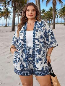 SHEIN CURVE+ Kích cỡ US22 (dành cho người có thân hình đầy đặn) Thích hợp cho lễ hội âm nhạc, kỳ nghỉ bên bờ biển, phong cách bohemian. Áo kimono in hoa dáng rộng mở phía trước và quần short cạp chun. Trang phục thường ngày thoải mái cho nữ. - Màu xanh lam - Xem 5