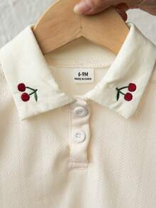 SHEIN Áo Polo mùa hè cho bé gái, chất liệu vải dệt kim jacquard mềm mại, khoét lỗ, cổ Peter Pan dễ thương, thêu hoa anh đào tinh tế, cổ áo mở nửa kín, kiểu Pháp ngọt ngào, thời trang, dễ thương, tươi mới. - Màu be - Xem 7