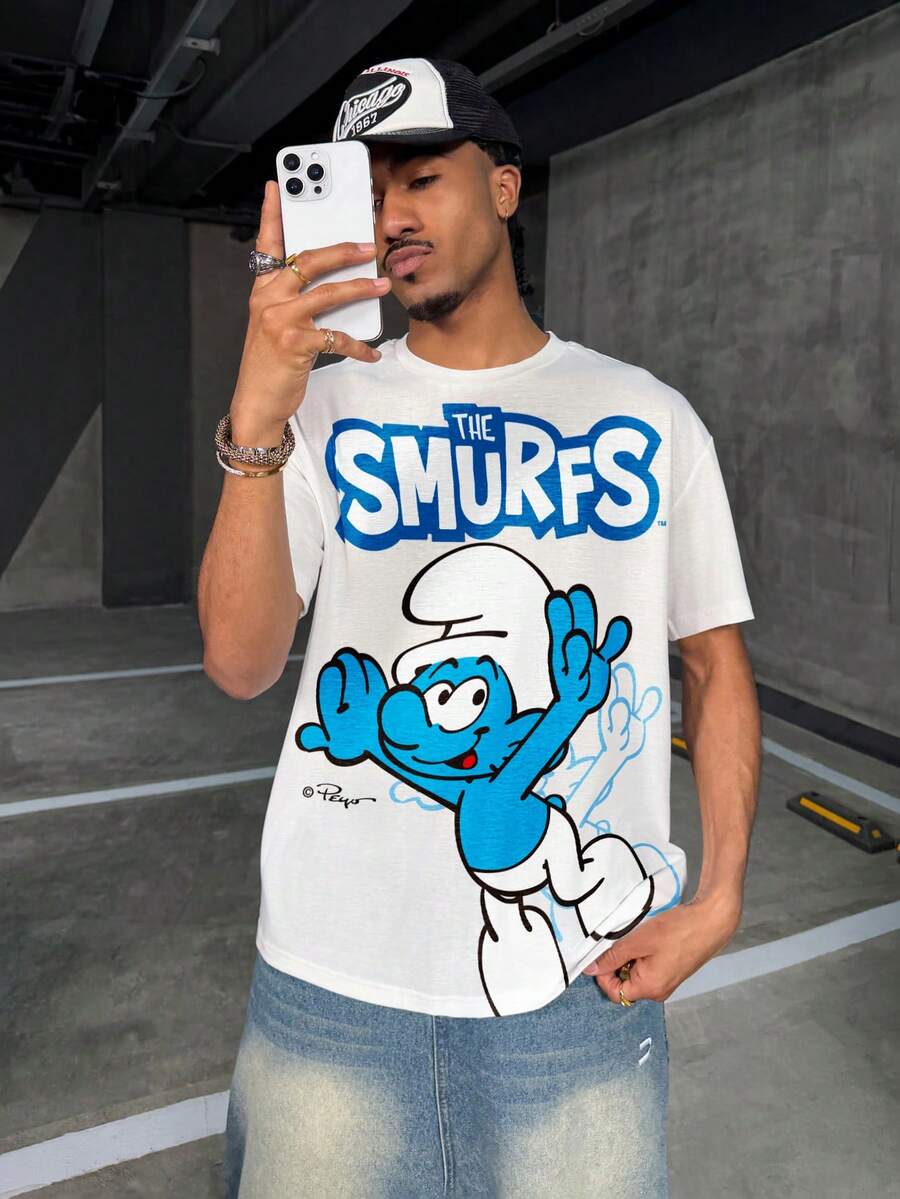 SHEIN X The Smurfs Áo thun nam tay ngắn cổ tròn in hình hoạt hình, kiểu dáng thường ngày. - trắng - Xem 1