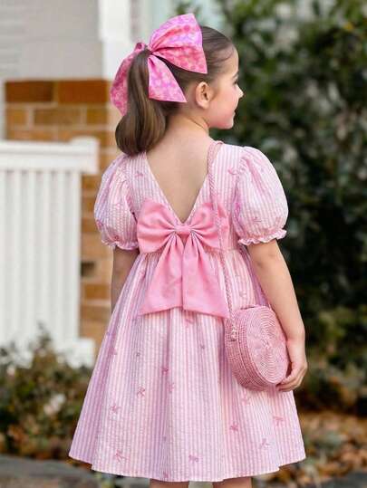 少女优雅粉色蝴蝶结装饰正式连衣裙，春夏款