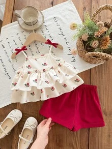 SHEIN Bộ đồ 2 mảnh dễ thương cho bé gái, gồm áo ba lỗ đen và quần short trắng đơn giản, được trang trí hoa 3D, rất phù hợp cho các bữa tiệc sinh nhật, tiệc tùng, biểu diễn, đám cưới, lễ rửa tội, lễ khai trương, mặc hàng ngày, đi học, dã ngoại và mùa xuân/hè. - màu đen - Xem 5