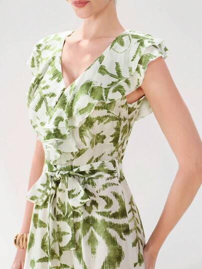 Aveloria Modichic Bộ jumpsuit cổ chữ V bèo nhún màu trắng và xanh lá cây, chất liệu vải sợi tre, ống quần rộng thẳng, nhẹ, thích hợp cho dã ngoại, đi biển, tụ họp thường ngày, tiệc trà chiều, hoạt động ngoài trời mùa hè, mang đến vẻ thanh lịch tự nhiên, thoải mái. Bộ jumpsuit không tay bèo nhún màu xanh lá cây và trắng, thắt eo, sang trọng và tinh tế cho công sở và các dịp thường ngày.