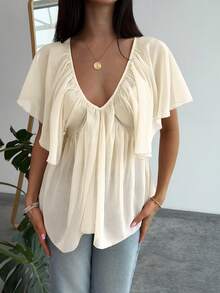 Aloruh Áo kiểu nữ màu trơn cổ chữ V sâu, kiểu dáng lãng mạn với bèo nhún ở gấu áo. - Màu be - Xem 9