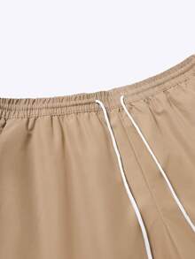 Manfinity RSRT Conjunto de camisa de manga corta con estampado de plantas tropicales de solapa única y pantalones cortos con cordón en la cintura para hombres de talla grande - Negro - Ver 6