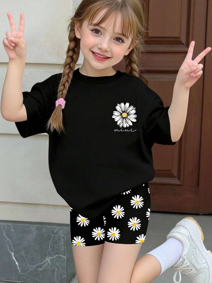 SHEIN Elladie kids 两件套少女夏季套装,可爱甜美的波西米亚雏菊图案,雏菊印花女童休闲宽松圆领短袖T恤搭配紧身五分钟半裙,适合日常穿着、居家、度假、节日等场合,营造春夏氛围,春夏装扮 - 黑色 - 查看 1