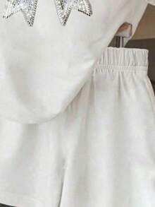 两件套少女甜美休闲套装，水钻蝴蝶结短袖T恤+宽松黑色短裤，适合春、夏、秋季日常休闲穿着，经典舒适的白色两件套，适合女孩和女性。 - 彩色 - 查看 3