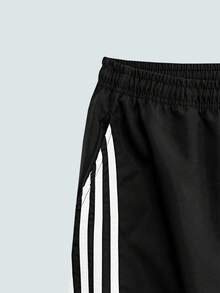 Modcrash Quần nỉ ống rộng kẻ sọc đỏ đen kiểu Mỹ cổ điển dành cho nam, quần ống thẳng thoải mái, phong cách Mỹ cổ điển, unisex, dáng rộng rãi, phù hợp cho trang phục mùa hè – Thích hợp cho mặc hàng ngày và trang phục đi nghỉ hè. - màu đen - Xem 4