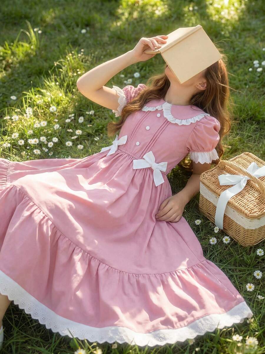 Đầm trắng dễ thương cho bé gái tuổi teen, cổ Peter Pan, tay phồng, thắt nơ ở eo. - Hồng - Xem 1