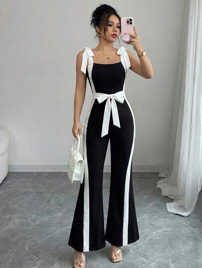 Elenzga Bộ jumpsuit nữ mùa hè màu đen trắng phối họa tiết dây đeo vai và nơ thắt eo, kiểu dáng thanh lịch, thích hợp làm quà sinh nhật, lễ hội, du lịch, đi biển, chụp ảnh, trang phục mùa hè.