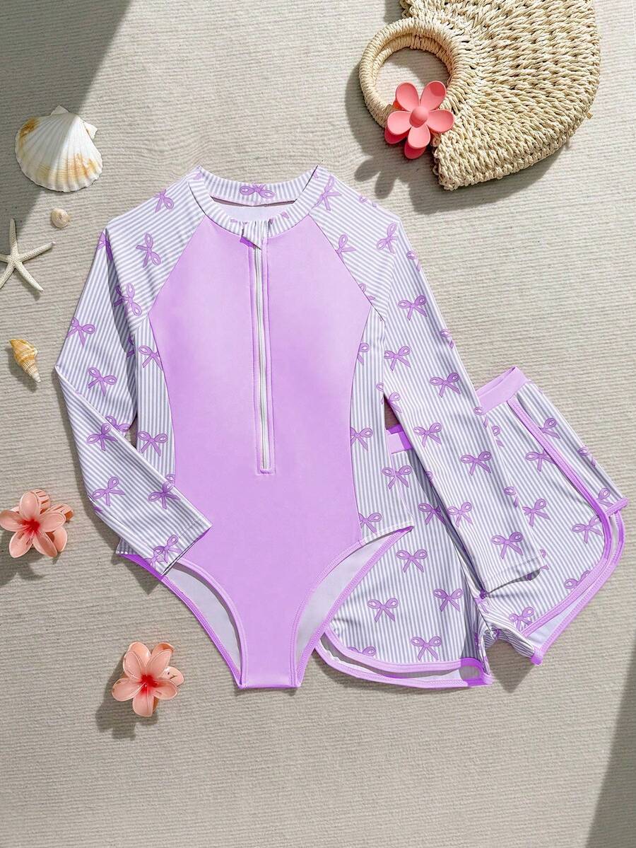SHEIN Đồ bơi cho bé gái tuổi teen, bộ đồ bơi hai mảnh mới mùa hè màu tím in nơ, tay dài, chống nắng, liền thân kèm quần short đi biển, bộ hai mảnh cho bé gái, chất liệu co giãn cao, thoáng khí, thích hợp cho kỳ nghỉ biển, suối nước nóng, vui chơi dưới nước. - Màu tím - Xem 1