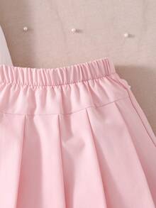 Elladie kids 2 pièces/Set Jeunes filles Top à manches courtes en tricot ivoire avec volants et nœud, et jupe plissée rouge avec perles. Tenue décontractée pour la Saint-Valentin, vêtements de printemps pour filles d'école. Tenues habillées pour filles. Vêtements pour filles. - Rose bonbon - Voir 5