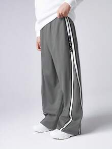 男童直筒侧边条纹宽松运动裤，适合秋冬季休闲、户外、上学穿着。 - 灰色 - 查看 4