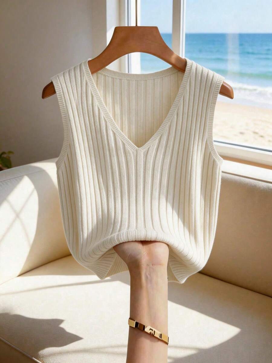 Franclia Áo khoác cardigan dệt kim gân sọc đơn giản kiểu Hàn Quốc màu kem, dáng rộng thoải mái, không tay, thiết kế cổ chữ V thanh lịch, đa năng cho cả ngày lẫn đêm, phong cách Pháp thư giãn, vẻ đẹp tối giản, áo len nữ hiện đại, áo vest dệt kim nữ, áo len trắng nữ, áo len nữ, áo vest nữ, áo khoác mùa đông, áo len nữ, áo len không tay, áo vest gân sọc, áo len chui đầu cho nữ, áo không tay. - Màu be - Xem 1